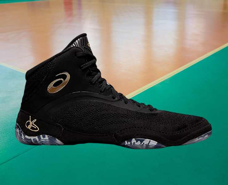 Side view of ASICS JB Elite V Wrestling Shoe on a gym floor