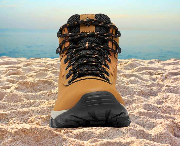 Toe View of Columbia® Newton Ridge™ Plus II Waterproof hiking boots on the beach sand