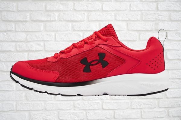 Side view of UNDER ARMOUR Charged Assert 9 Running Shoe