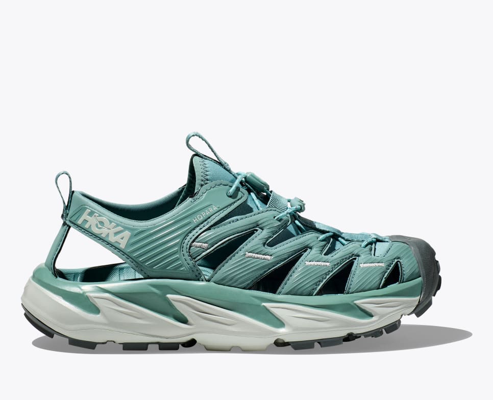 Side view of teal colored HOKA Hopara All-Terrain Shoe